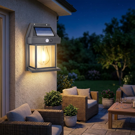 Solar wall lamp illuminating a patio at night - lifestyle