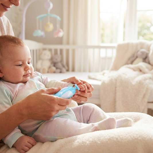 Parent using a baby nail trimmer on an infant - lifestyle
