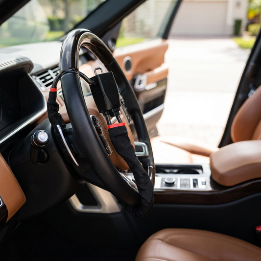 Universal car steering wheel lock installed on a steering wheel - lifestyle